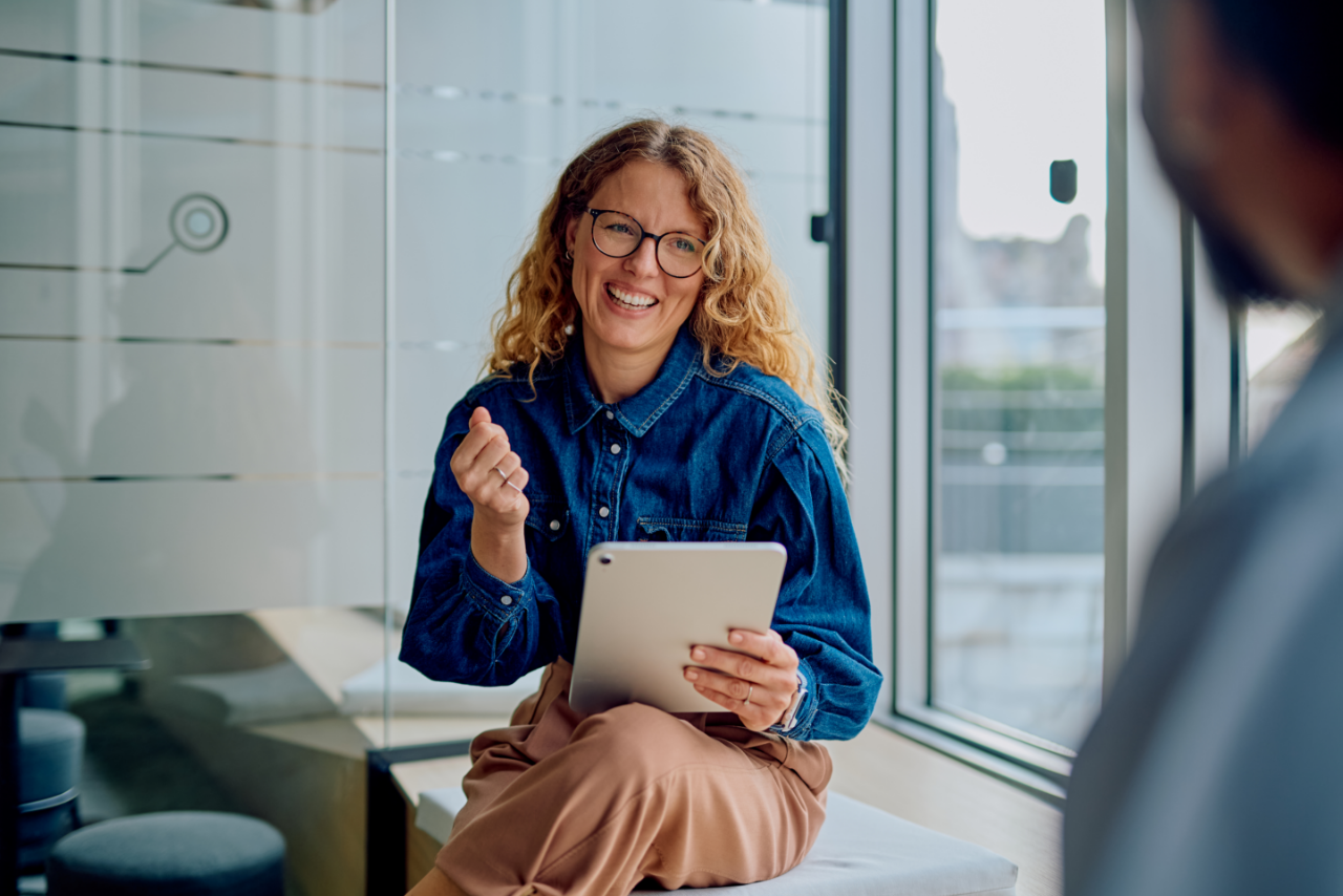 Happy office worker with fast internet speed